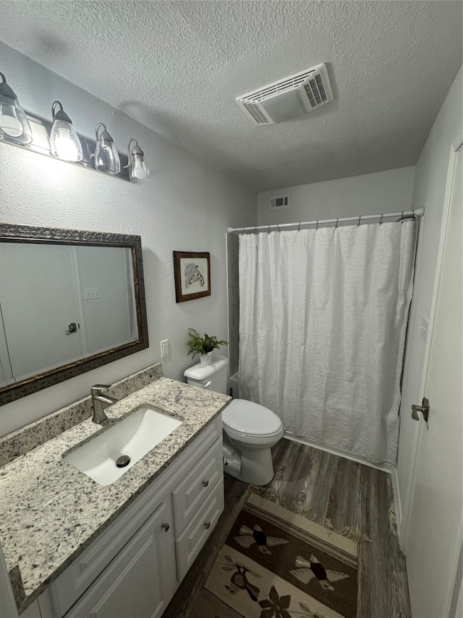 Granite counters throughout the kitchen and bath