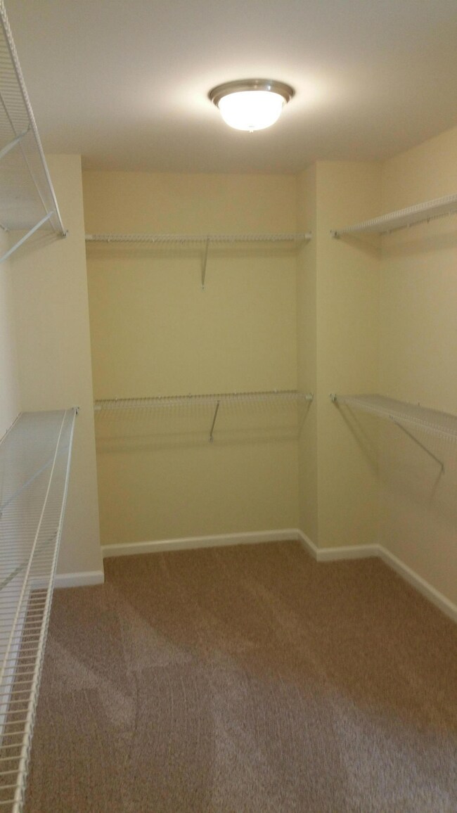 SPACIOUS MASTER CLOSET WITH SUPER SLIDE