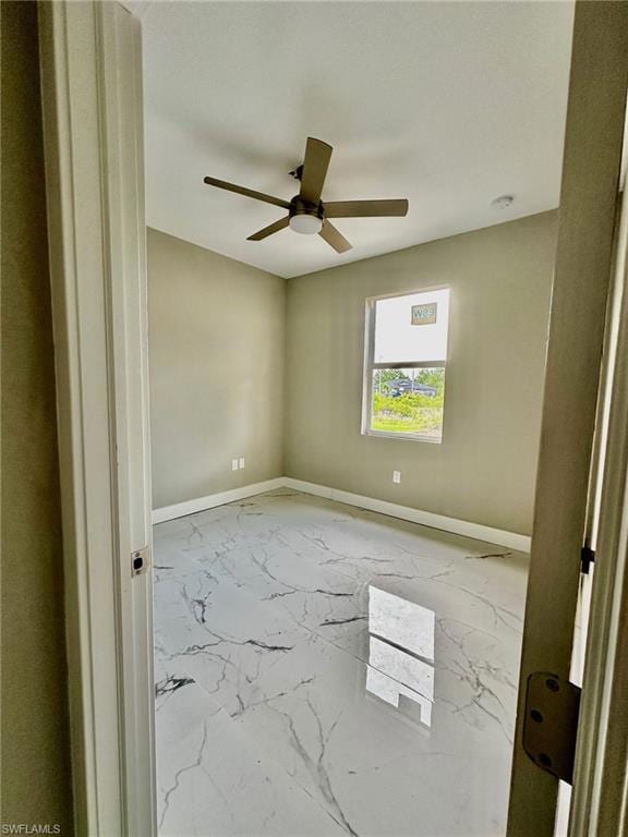 Unfurnished room featuring ceiling fan