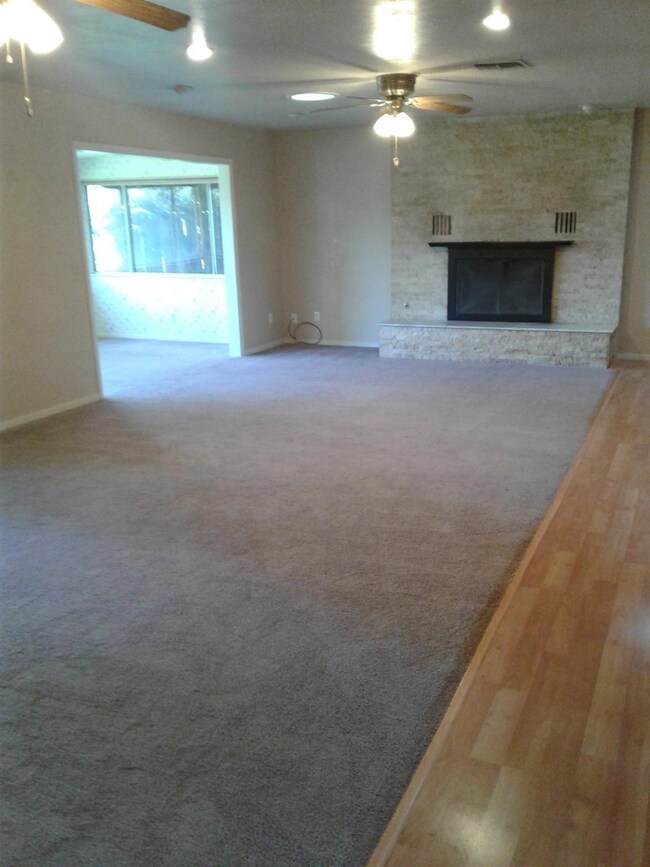 Large living room with view into un-perm