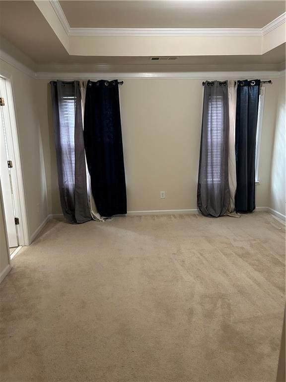 Unfurnished room with ornamental molding, baseboar