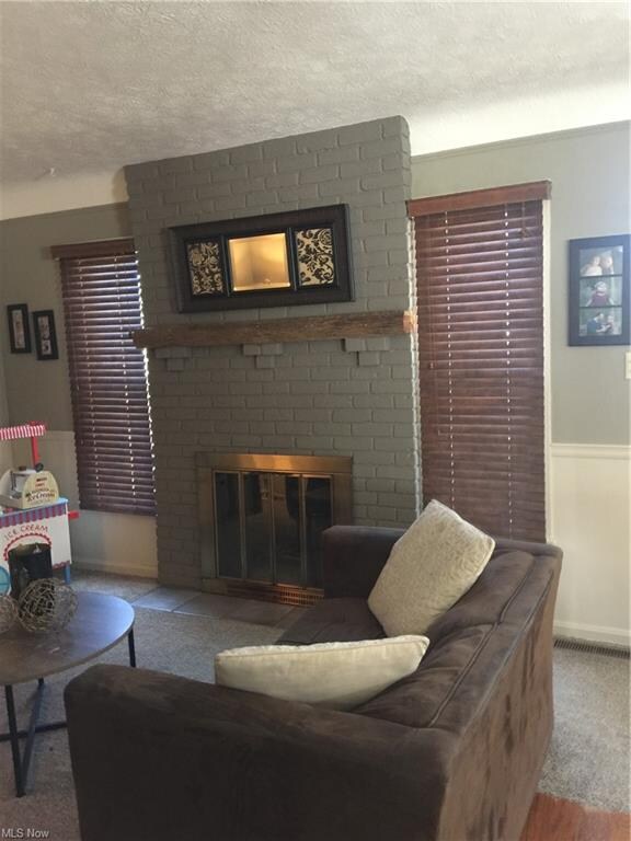 Cozy up to the fireplace in living room!