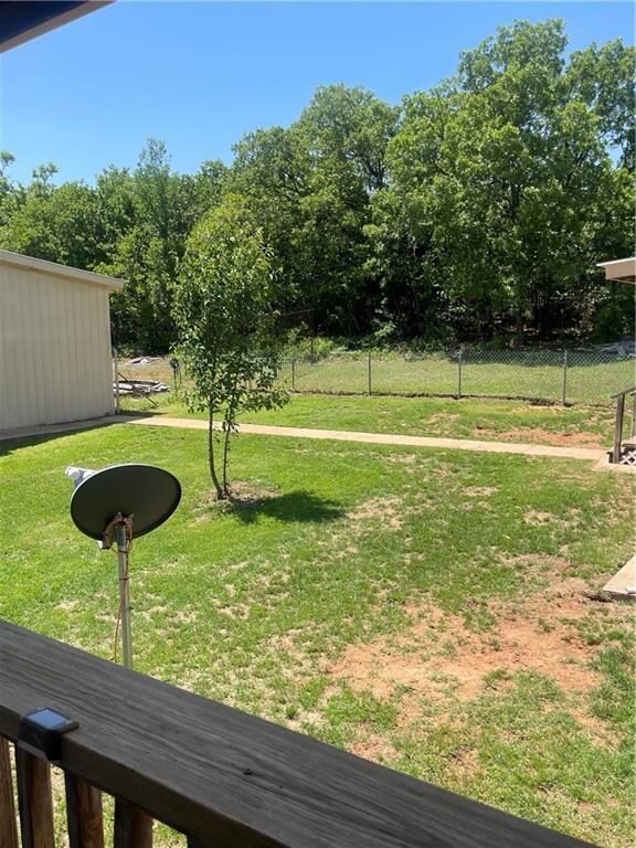 Back yard looking at office connected to house by 