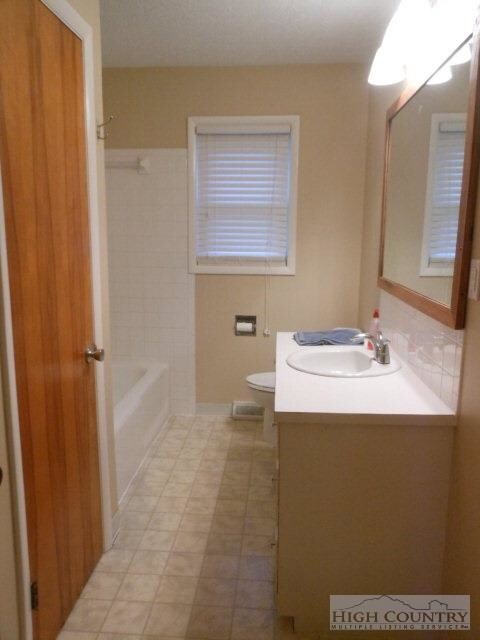 BREEZEWAY: The breezeway between the garage and house is a delightful space.