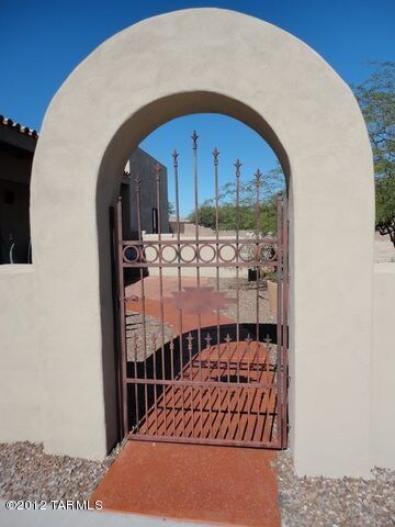 Closeup of Custom Arched Iron Gate