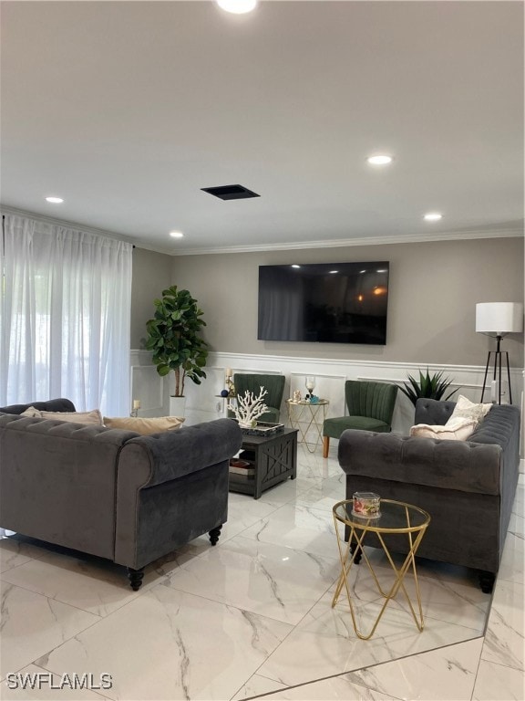 Living room with ornamental molding, recessed ligh