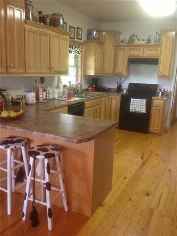 Nice kitchen with hickory cabinets.