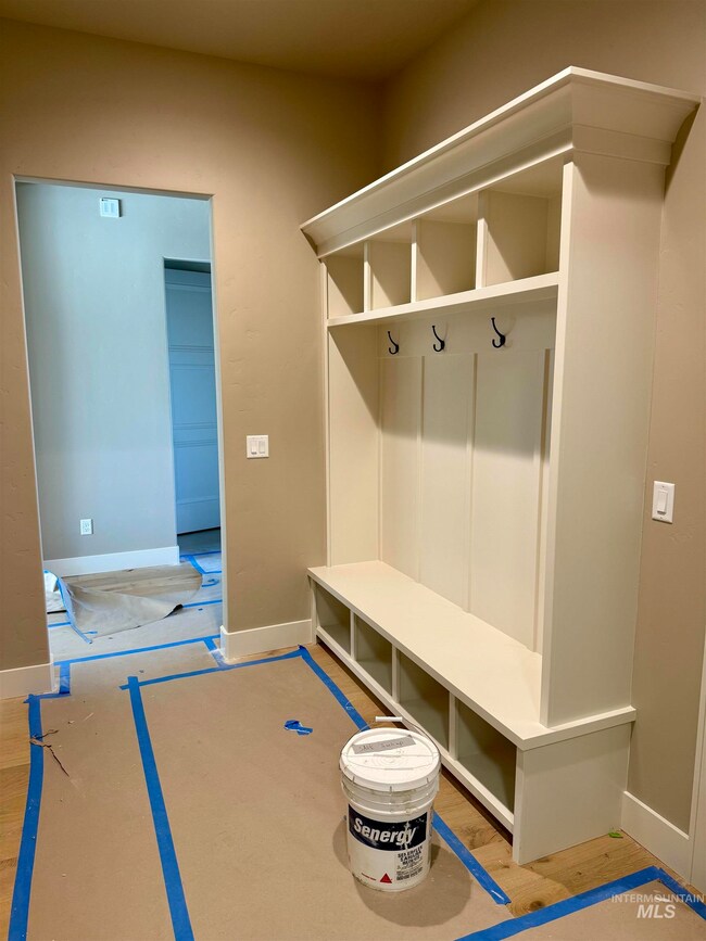 Mudroom featuring wood finished floors