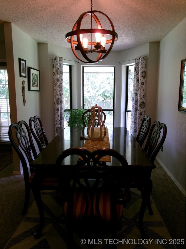 DINING AREA WITH GREAT NATURAL LIGHT FROM BAY WIND