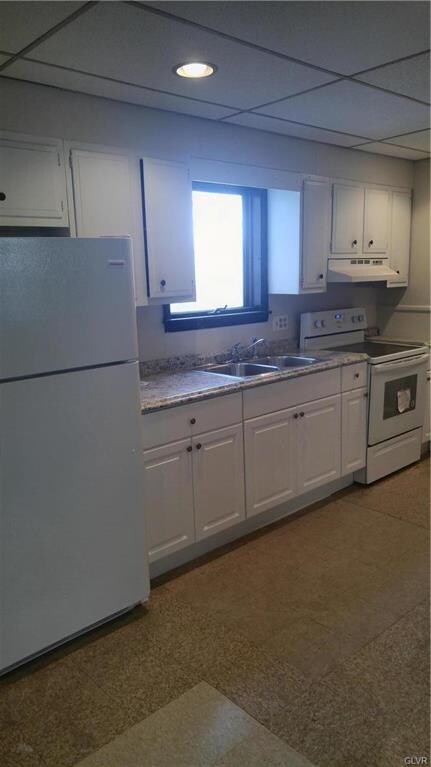 Kitchen with new countertop, cabinets, frig and ov