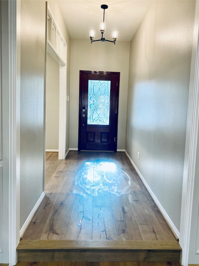 New, waterproof flooring & light fixture at entry