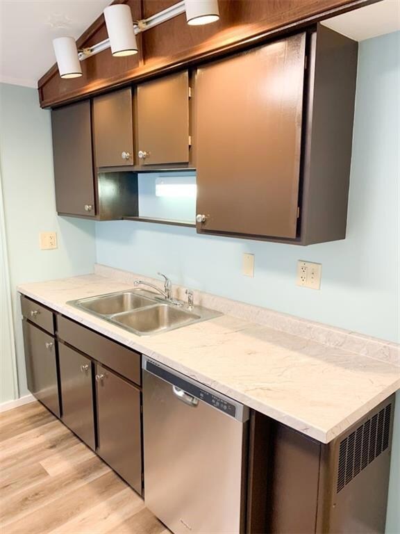 Upstairs kitchen equipped with a dishwasher