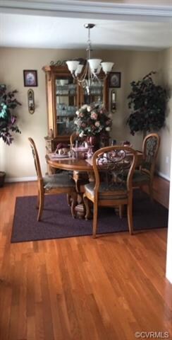 Formal dining room with hardwood floors