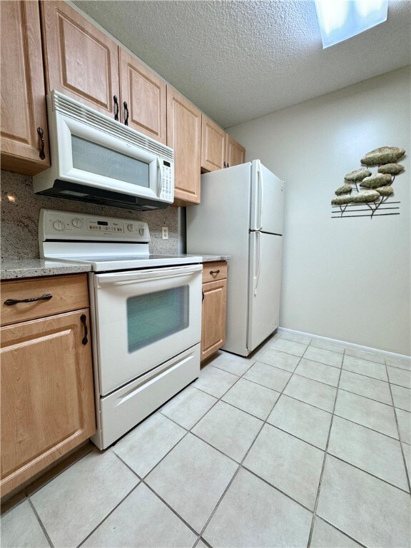 Renovated kitchen w/ granite countertops & refaced