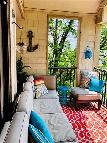 MATURE LANDSCAPING OFF YOUR BACK DECK------THIS END UNIT BOASTS TWO DECKS ------ENJOY THE TREE HOUSE EFFECT