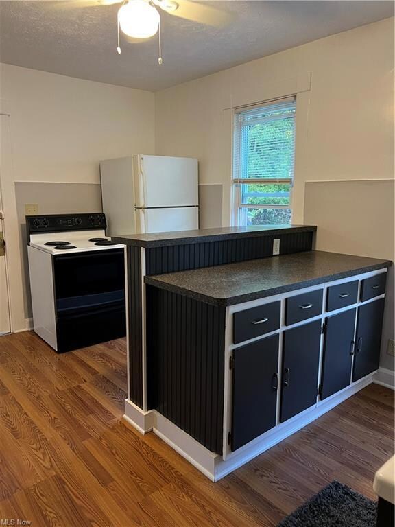 Kitchen 14 x 11 with laminate flooring.