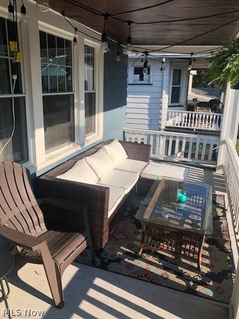 View of patio with an outdoor living space