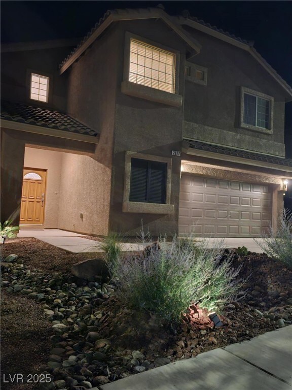 front of structure at night