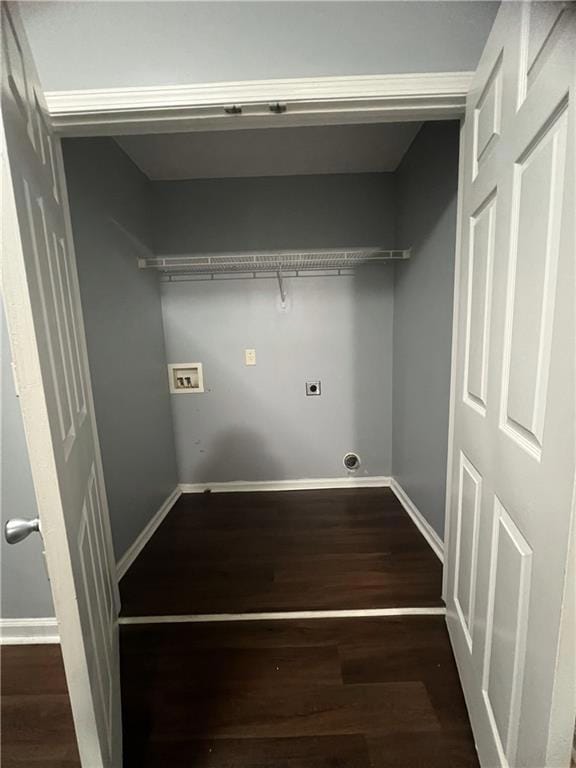 Laundry room with washer hookup, wood finished flo