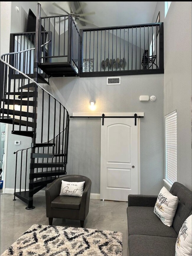 Unit ALiving area featuring visible vents, finishe