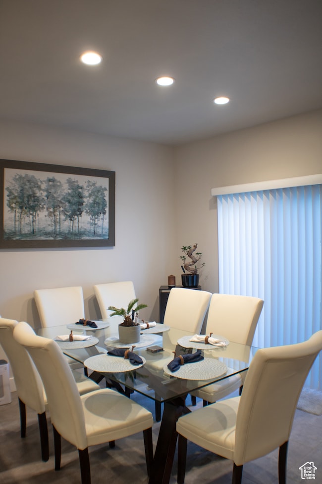 Dining area featuring recessed lighting