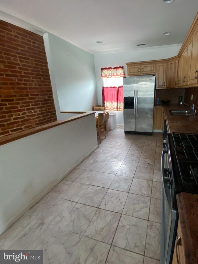137 N Belnord Ave, Baltimore, MD 21224 - photo 7