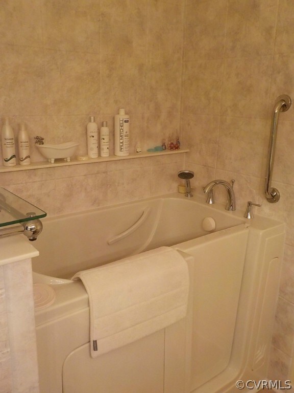 Master bath with tile floor newer walk-in jetted t
