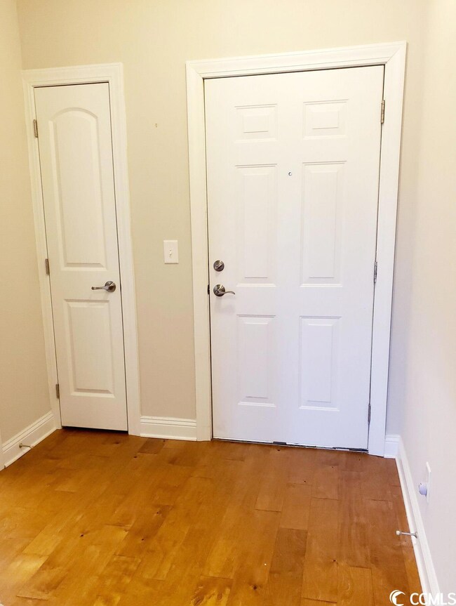 Coat closet immediately to the left or to the righ