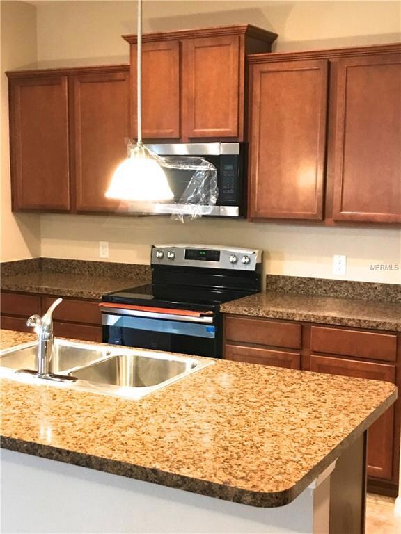 Kitchen with New Stainless Steel Appliances