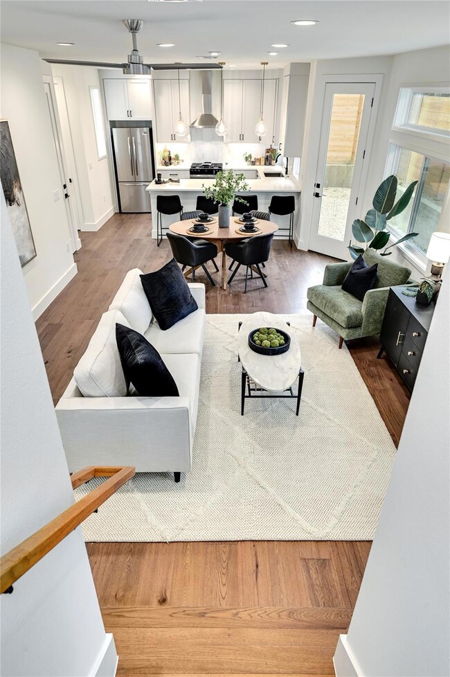 Living area featuring recessed lighting, baseboar