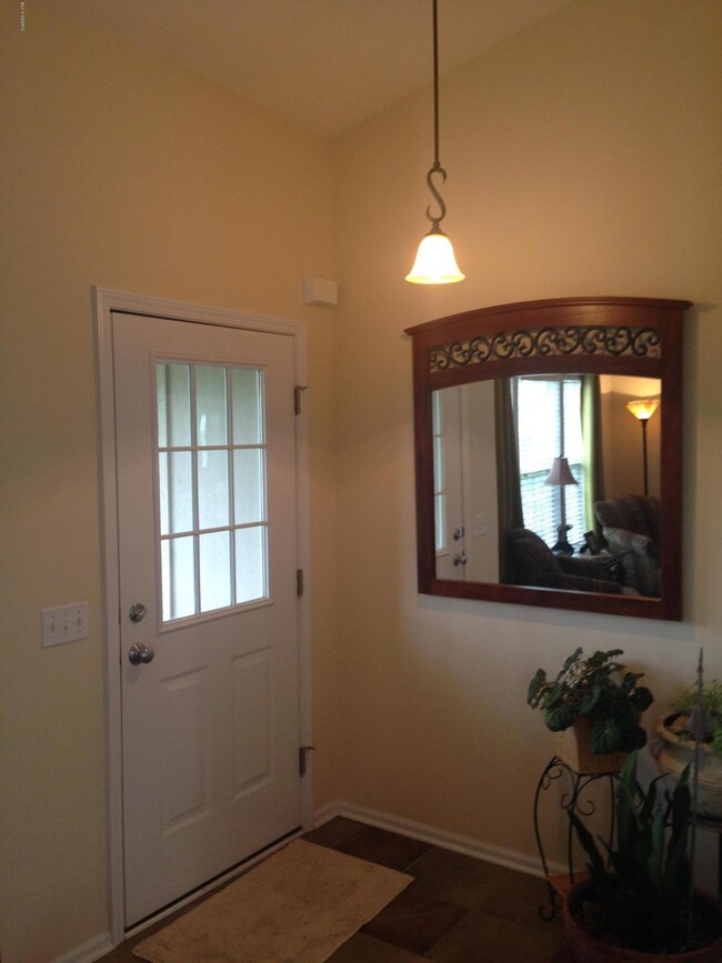 haystack foyer with ceramic tile floor