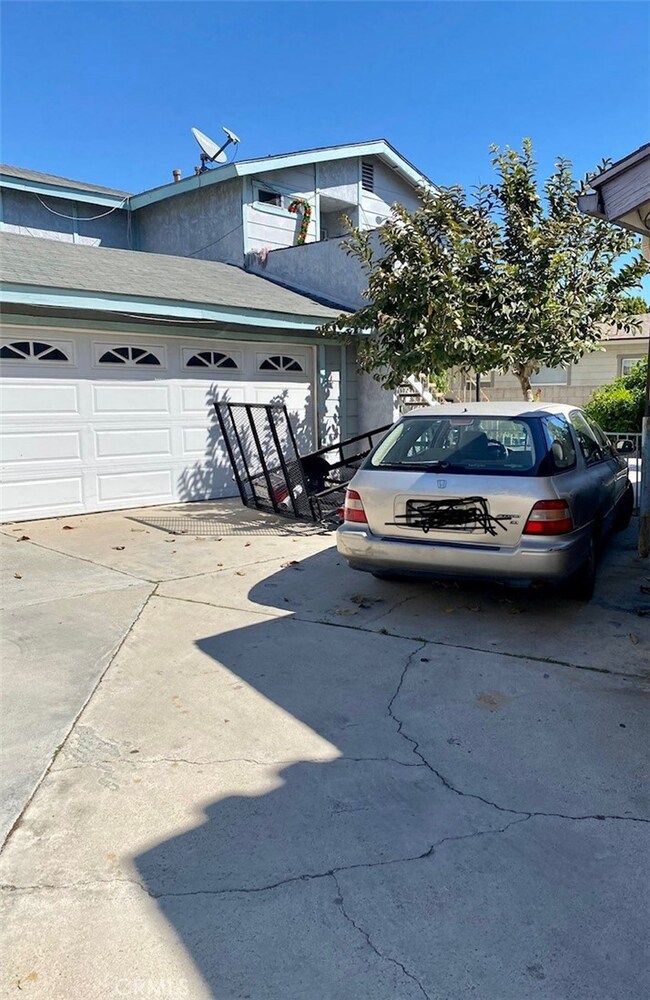 Plenty of parking for cars plus 2 car garage