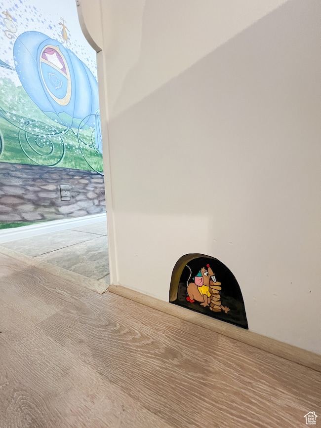 Detailed view of carpet floors and baseboards