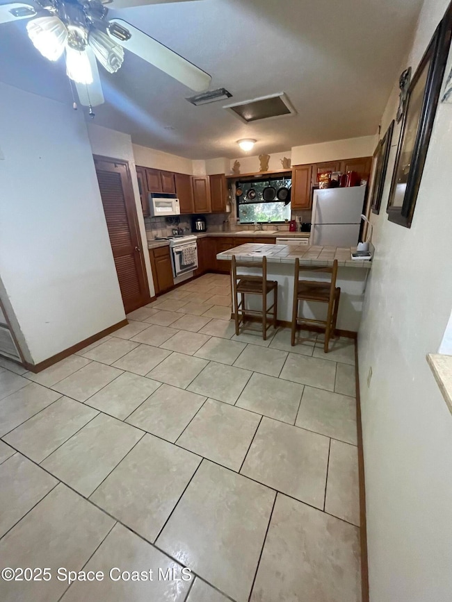 1144 N Singleton Ave, Titusville, FL 32796 - photo 6