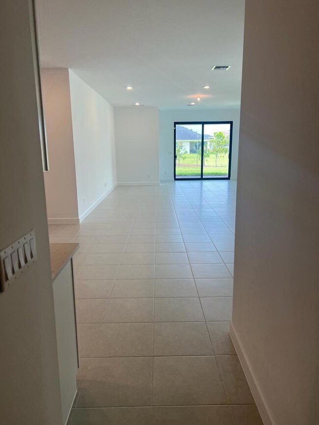 1235 Tangled Orchard Trace, Loxahatchee, FL 33470 - photo 7