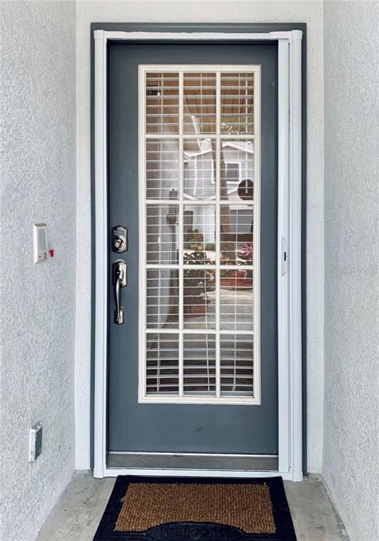 Programmable keypad front door with sliding screen