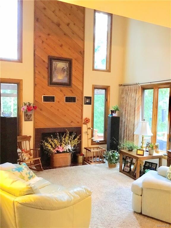 With a soaring 23' ceiling, the tall windows and a