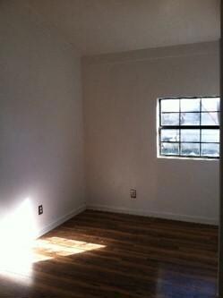 Upstairs master bedroom is bright and sunny.