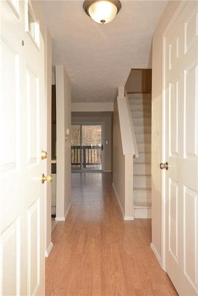 Front entrance. Half bath doorway on the right. Co