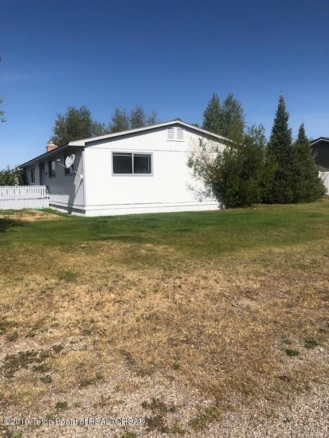 Side View of Home From the Corner of Buf