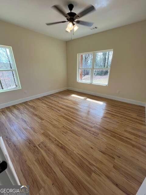 Master Bedroom with luxury vinyl flooring.
