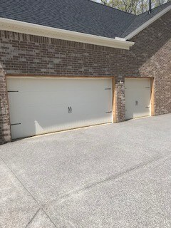 Three car side entry garage. Photo of actual home. For comp purposes only. 