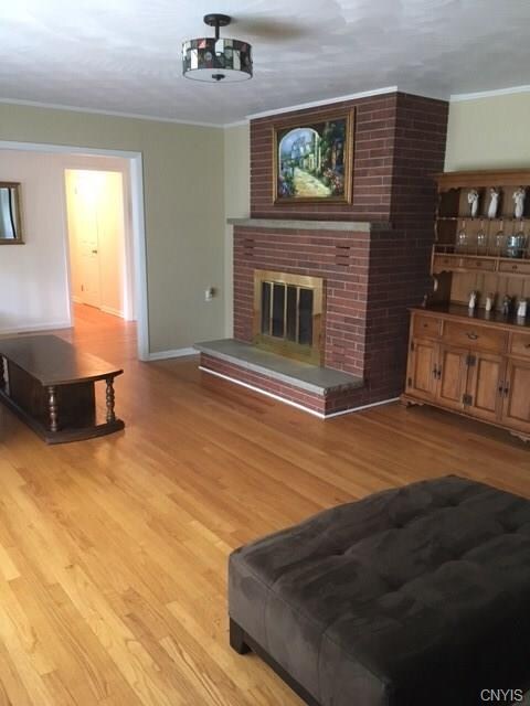 Formal living room is adjacent to the entry foyer 