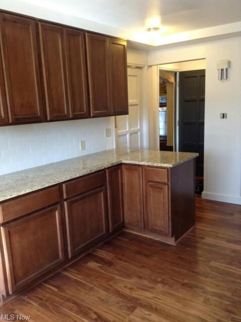 New granite counter tops and beautiful wood cabine