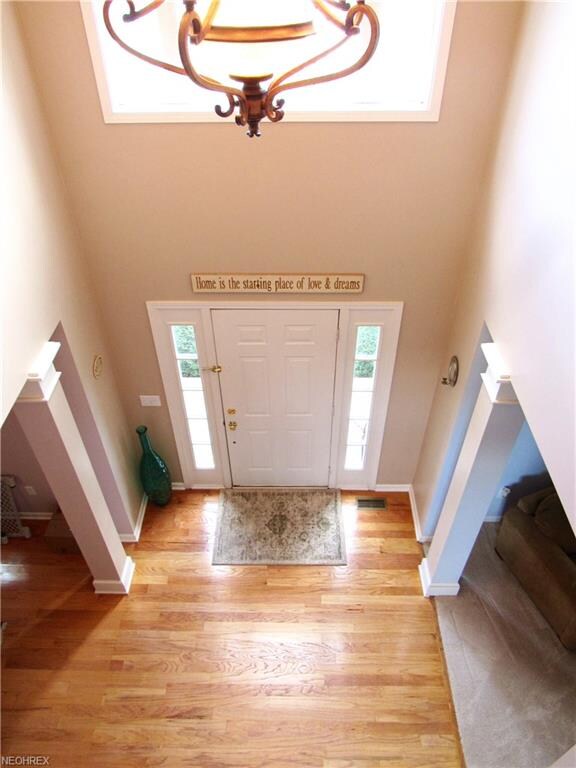 The 2 story foyer welcomes you into this lovely ho