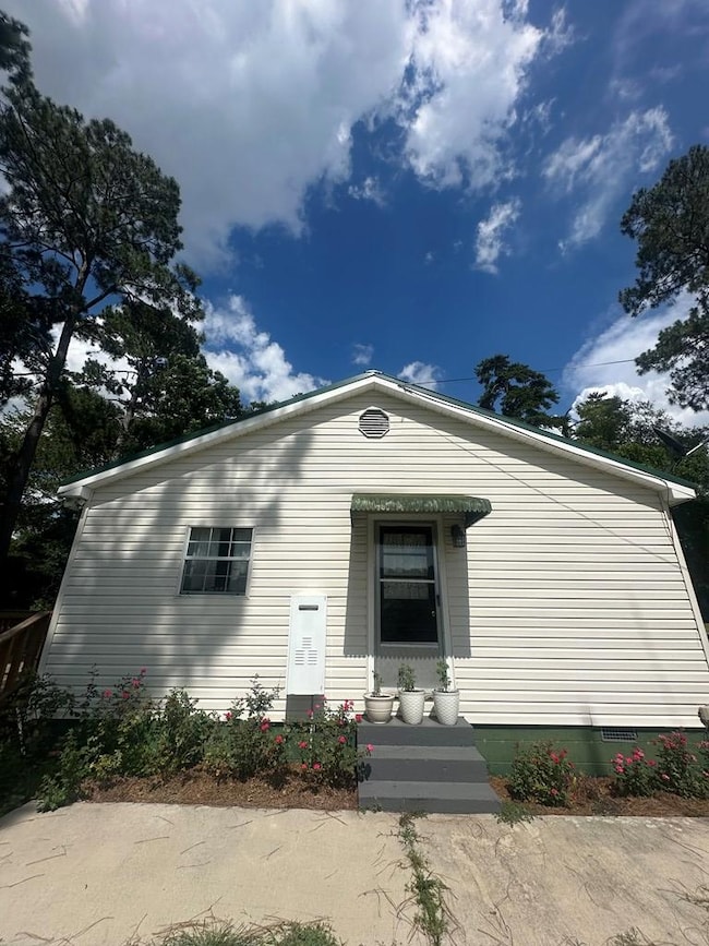 Side of home-on demand hot water heater