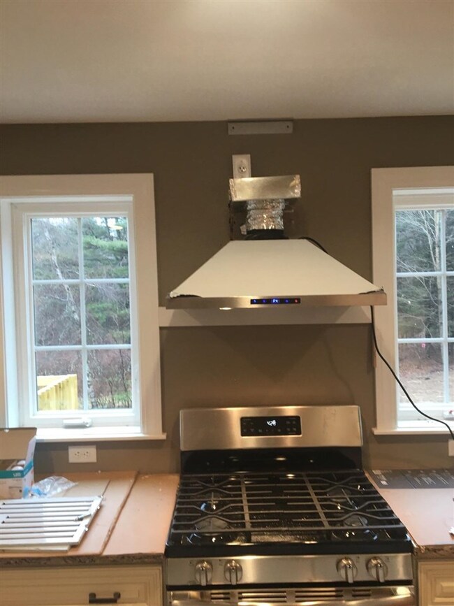 Truly one of a kind kitchen layout with ample cabi
