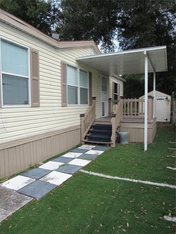 Covered side porch with walkway