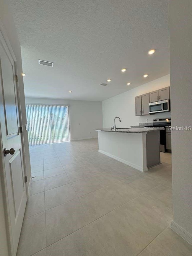 7627 Waterscape Dr, Groveland, FL 34736 - photo 6