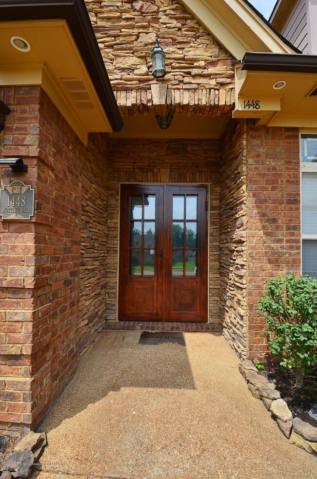 Front entrance with stone